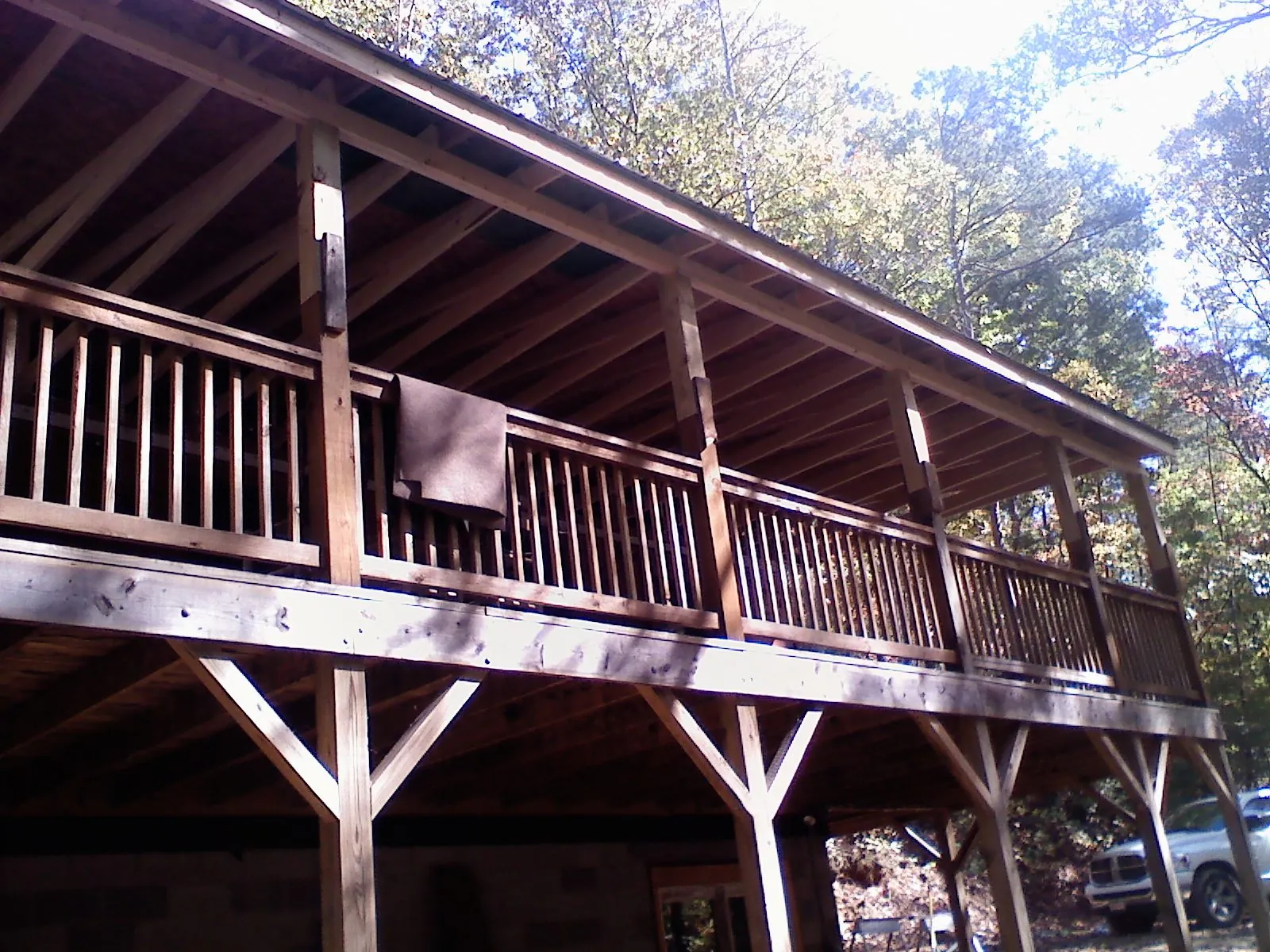 Timber framing under a new elevated porch and deck — Roof Leak Repair in Copper Hill by Roofing Brothers